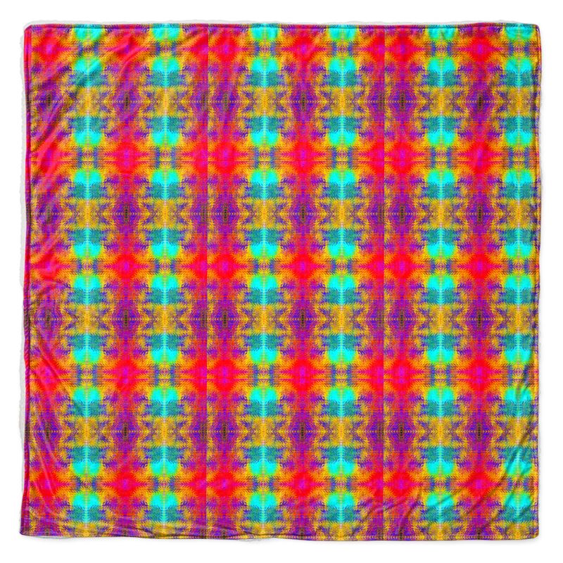 A sofa of bed throw in a very bright colourful colours.