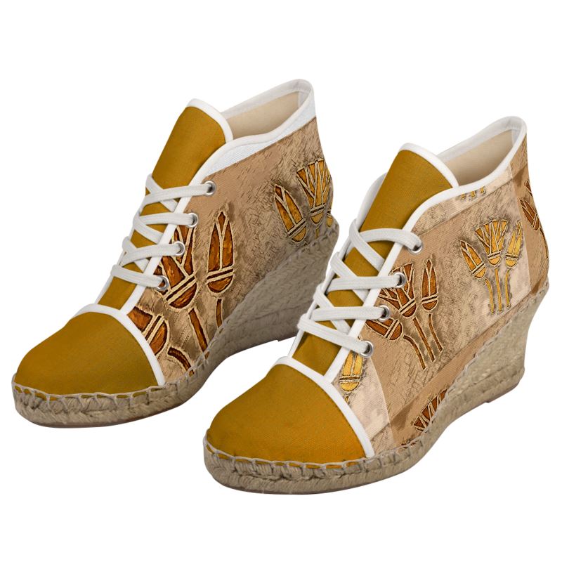 The sides of both wedges espadrilles.